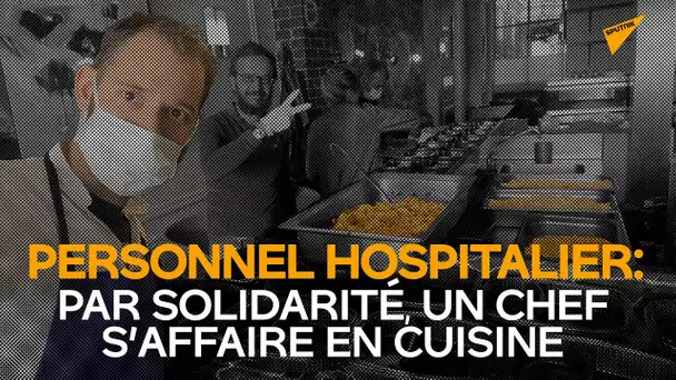 Un chef s’affaire en cuisine par solidarité avec le personnel hospitalier