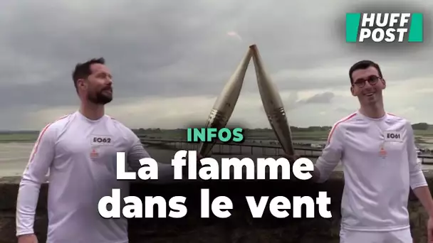 Au Mont-Saint-Michel, Thomas Pesquet récupère la flamme olympique en plein vent