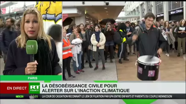 Paris : des activistes pour le climat envahissent un centre commercial