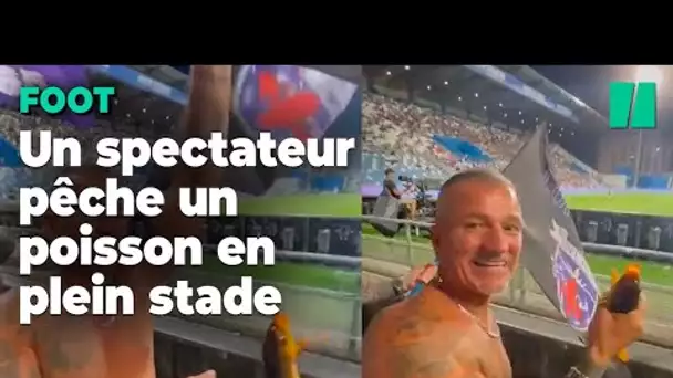 En plein match de foot, ce supporter pêche un poisson dans le stade