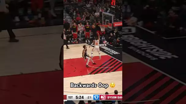 Trae Young throws a BACKWARDS Oop 👀