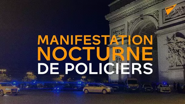 Manifestation nocturne de policiers devant l'Arc de Triomphe