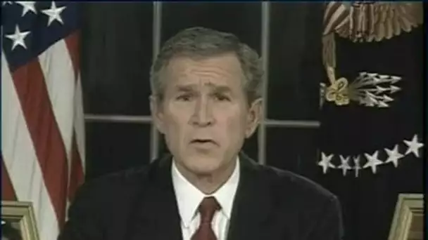 [Georges W.Bush et Saddam Hussein]