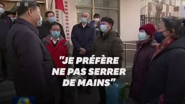 Masqué, Xi appelle à des mesures plus fortes contre le coronavirus