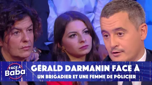 Un brigadier et une femme de policier font face à Gérald Darmanin