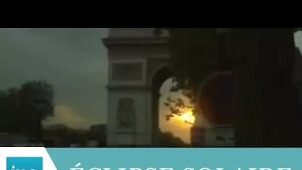 Eclipse solaire sur les Champs-Elysées - Archive INA