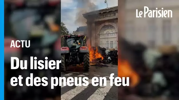 Des agriculteurs mettent le feu devant la préfecture d'Agen