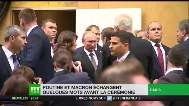 Macron et Poutine échangent quelques mots avant la cérémonie