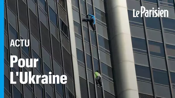 Paris : deux hommes vêtus aux couleurs de l’Ukraine escaladent la tour Montparnasse