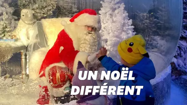 Covid-19 oblige, ce père Noël au Danemark attend les enfants dans sa boule à neige