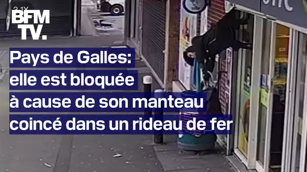 Une femme bloquée à plusieurs mètres du sol, à cause de son manteau coincé dans un rideau de fer