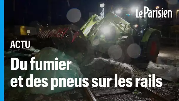 Les agriculteurs paralysent la gare d'Agen avec du fumier et des pneus