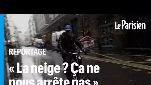Entre galère et euphorie, les cyclistes sous la neige à Paris
