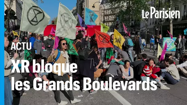 Extinction Rébellion : des centaines de militants bloquent le boulevard Saint-Denis à Paris