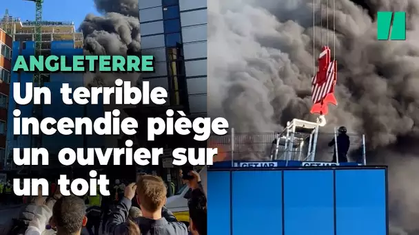 Coincé sur un toit en feu, un ouvrier sauvé in extremis par une grue à Reading