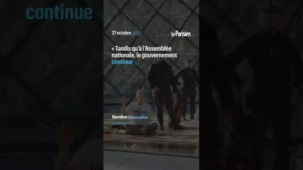 Paris : des militants écologistes escaladent la pyramide du Louvre pour la repeindre en orange