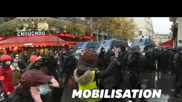 Sécurité globale: à Paris, des dizaines d'interpellations et une manif ultra-encadrée