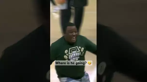 This fan ran right out the gym after the halfcourt make 🤣 | #Shorts