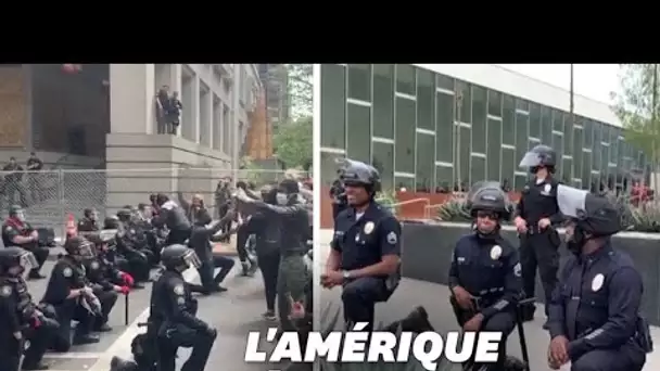 Genou à terre, certains policiers américains montrent leur soutien aux manifestants