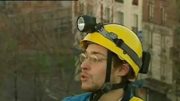 Couvreurs alpinistes à Paris