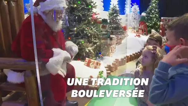 Covid-19: La photo avec le père Noël se fait devant une vitre aux États-Unis