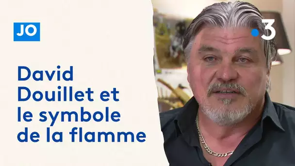 JO. David Douillet et le symbole de la flamme