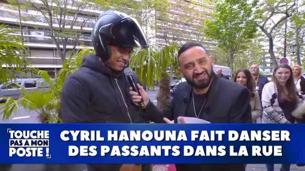 Cyril Hanouna fait danser des passants dans la rue