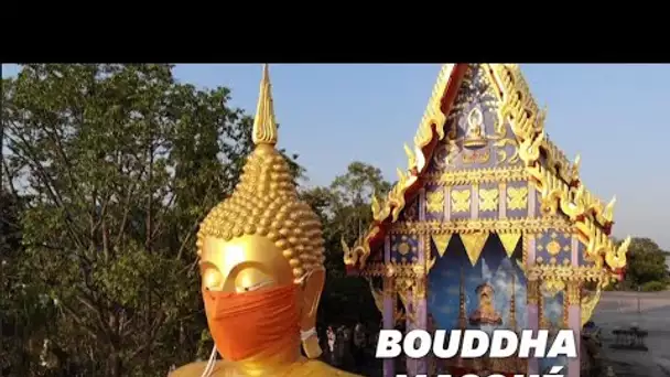 En Thaïlande, des Bouddhas masqués pour promouvoir le port du masque