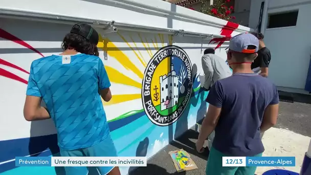 Gendarmes et jeunes autour d'un projet commun avec la réalisation d'une fresque
