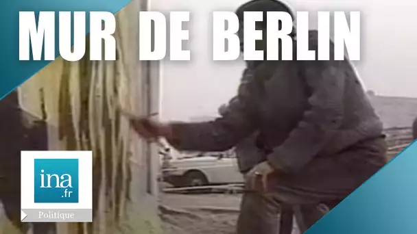 Le Mur de Berlin Est repeint par des artistes | Archive INA